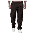 Brown cargo pants worn by a person on a white background