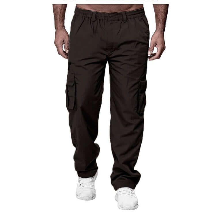 Brown cargo pants worn by a person on a white background