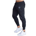 Black jogger pants with a logo on a white background