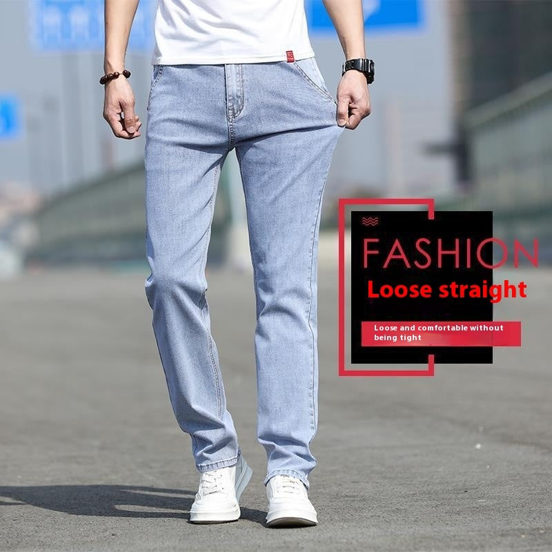 Person wearing light blue jeans with a fashion label overlay on a blurred street background
