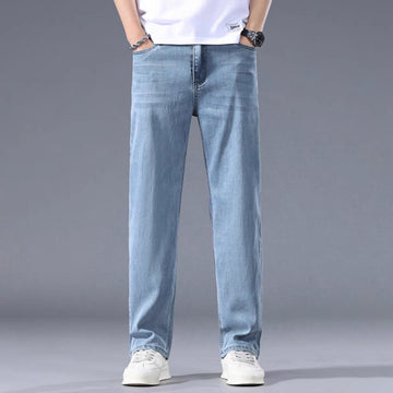 Man wearing straight fit lightweight mid-waist denim jeans
