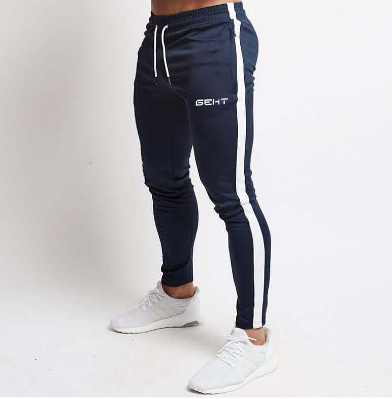 Navy jogger pants with white stripes and 'GENT' branding on a white background