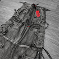 oversized hip hop wide-leg baggy denim jeans, shown from front view  with a red tag on a wooden floor