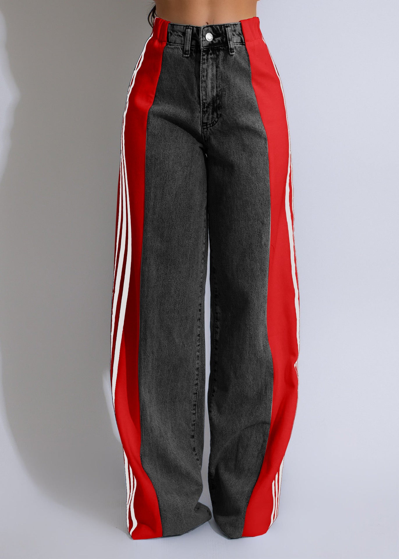 Black jeans with red and white stripes on a gray background