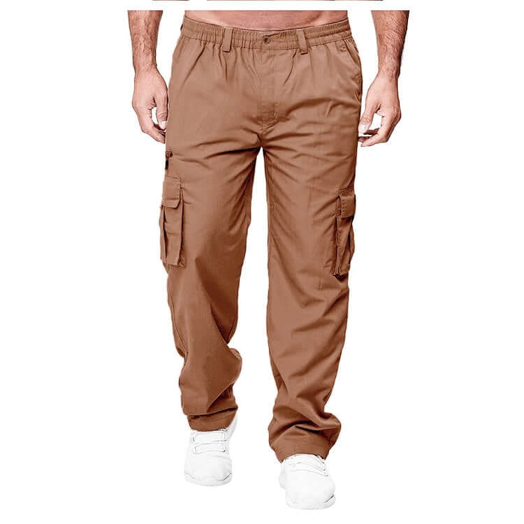 Brown cargo pants worn by a person on a white background